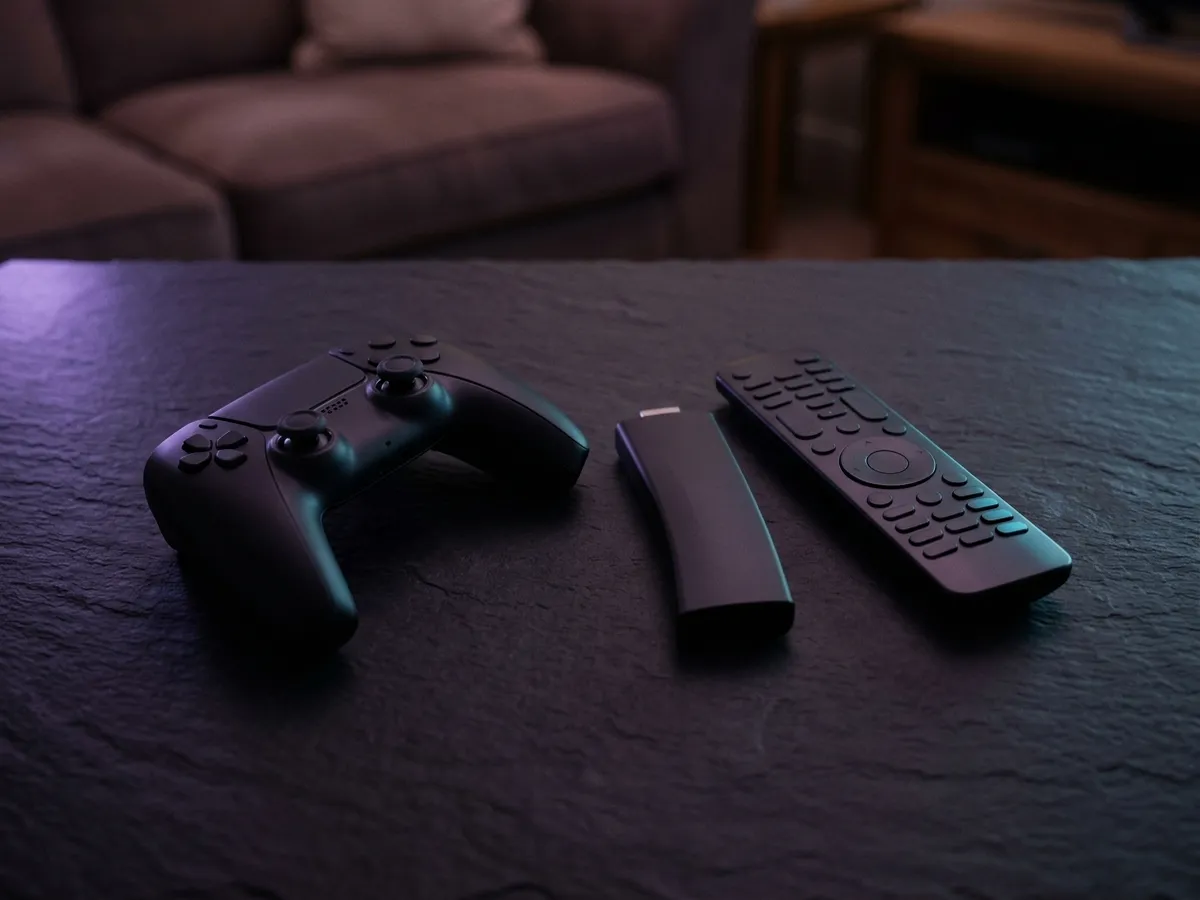 A smart television with built-in apps and an empty shelf below