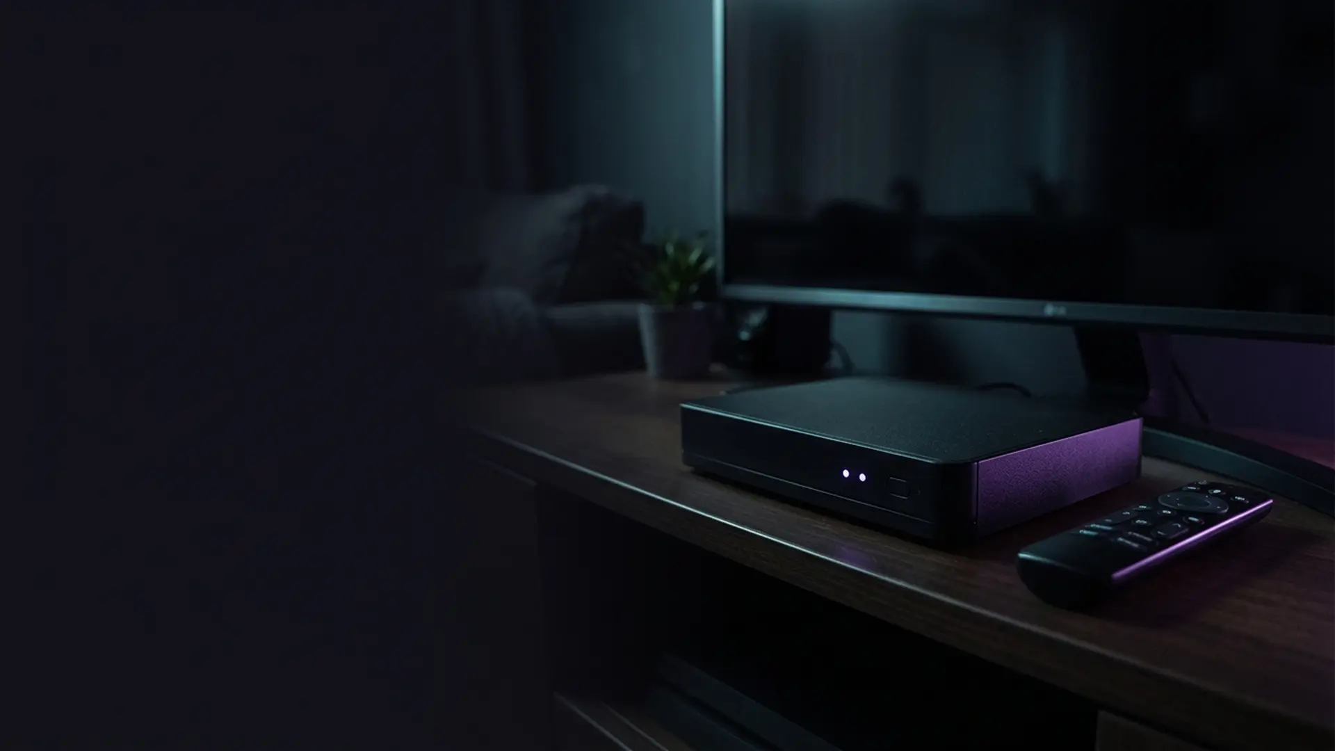 A television recorder box with a glowing recording indicator