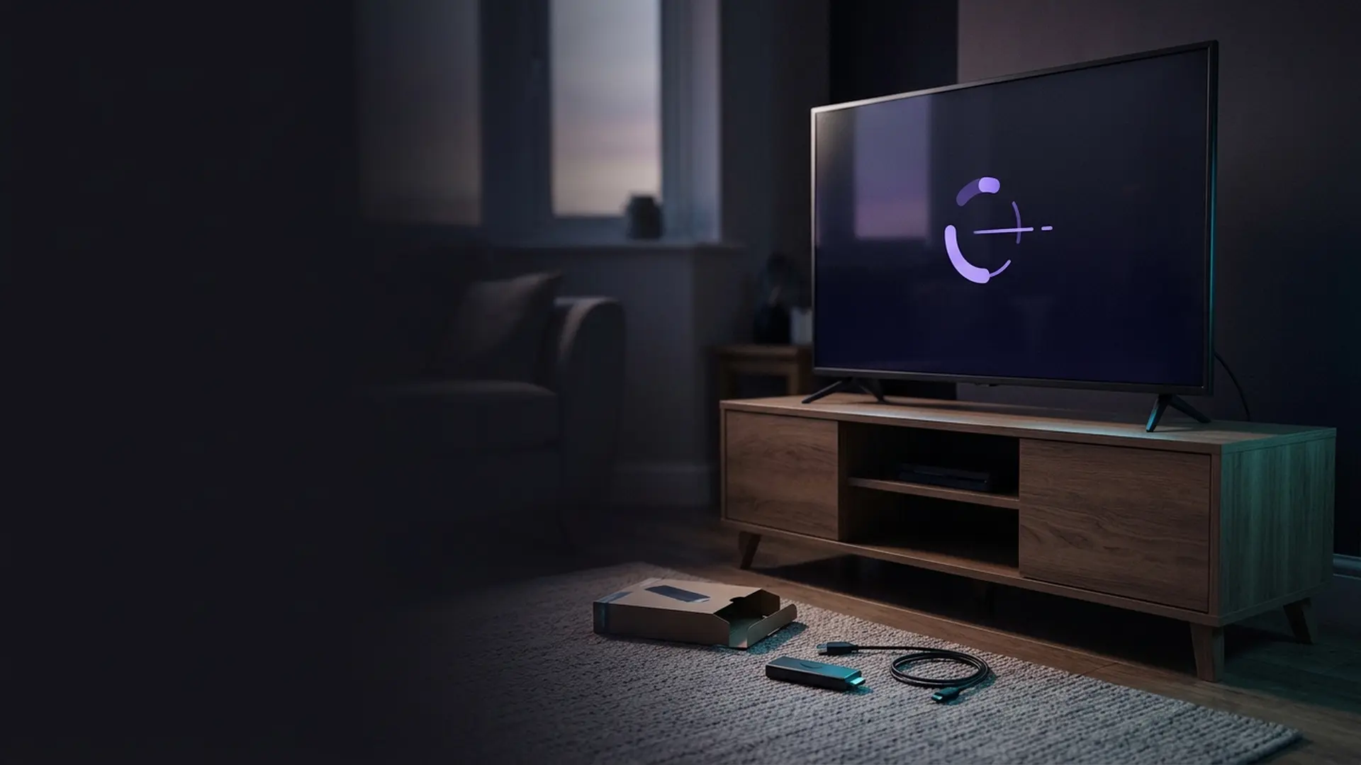 A new streaming device unboxed in front of a dark television