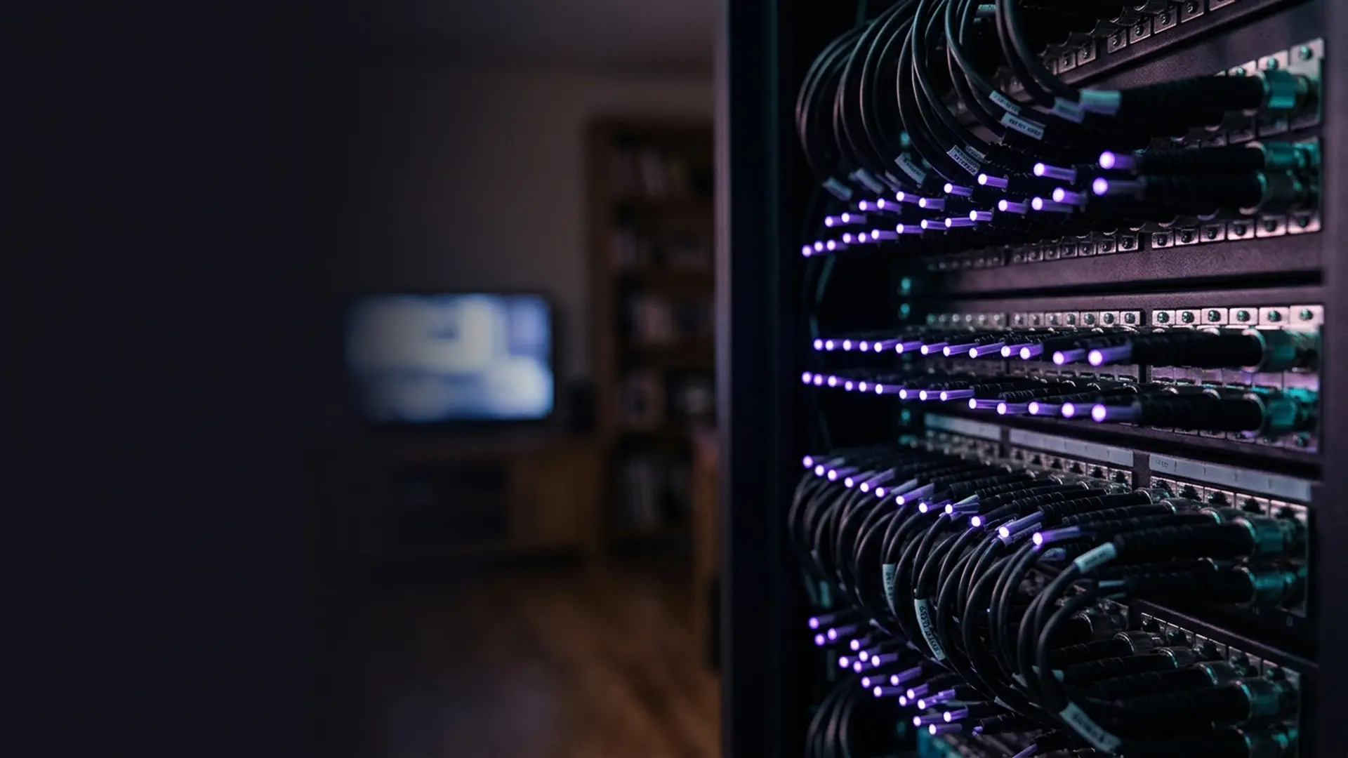 Fibre optic strands carrying light into a television screen