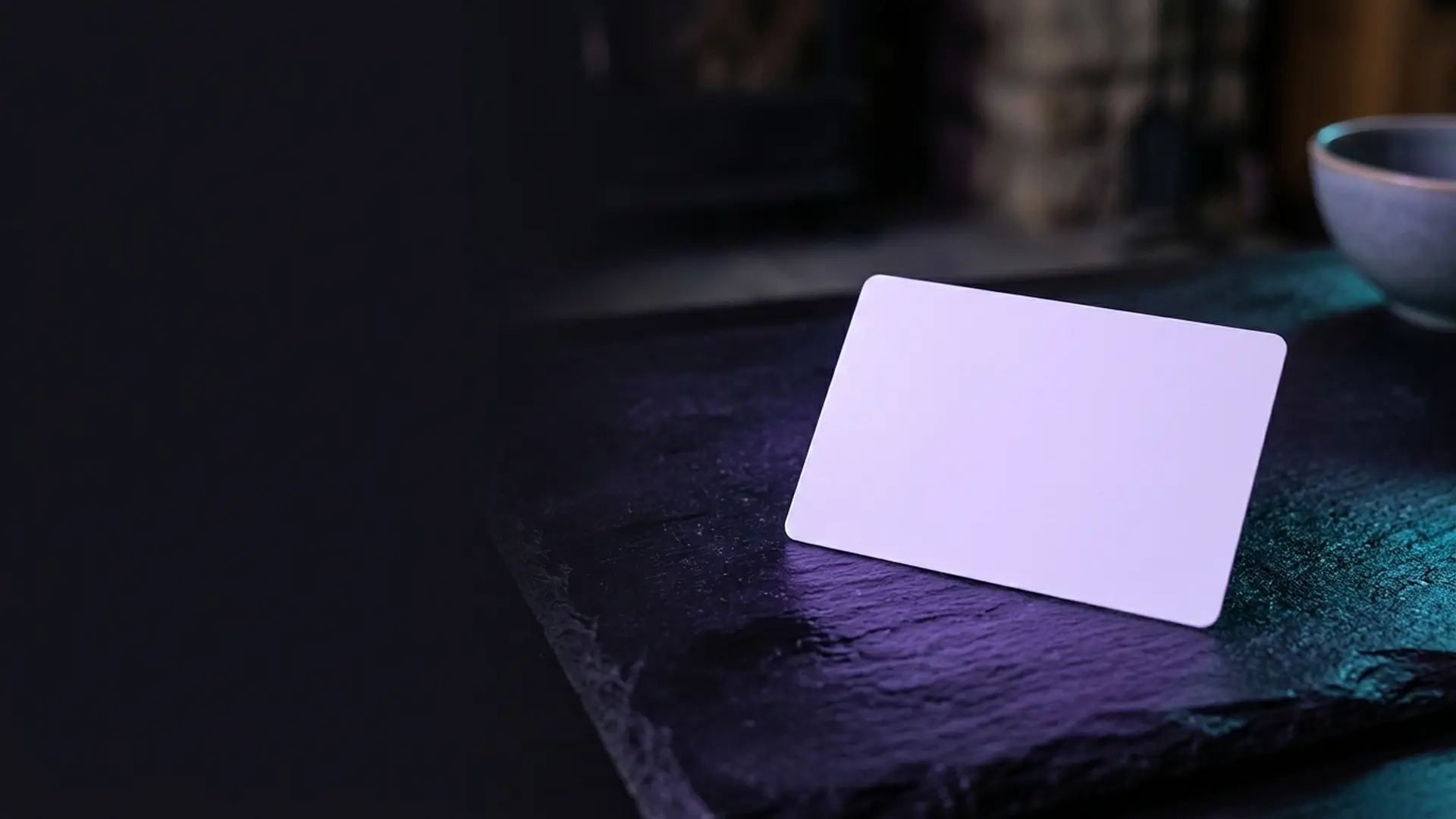 An opened gift box that is empty except for a faint glow